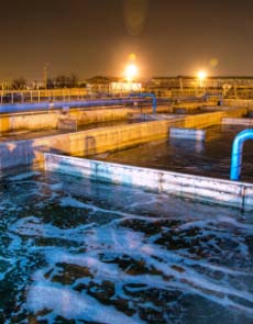 Wastewater treatment plant at night